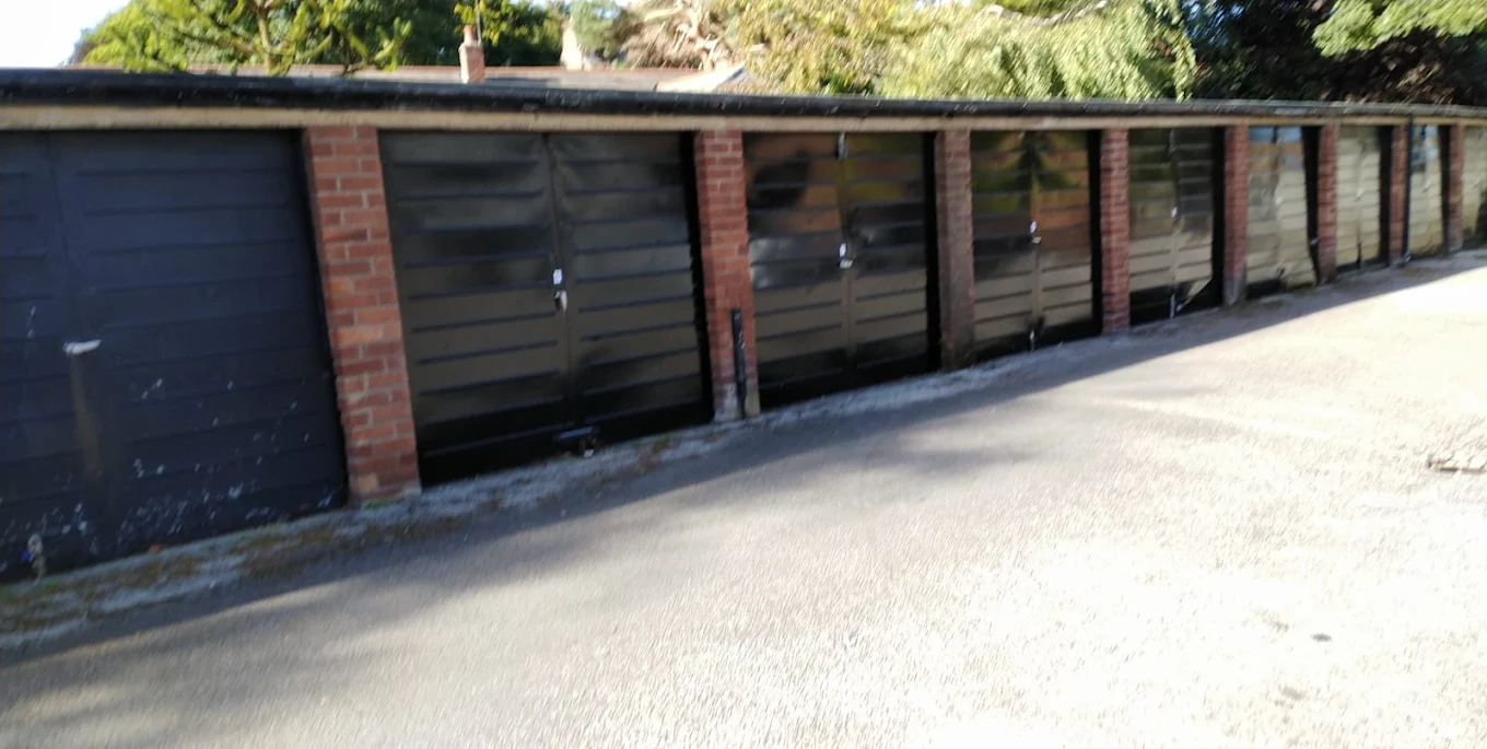 Traditional wooden garage doors with brick pillars in Forest court, Wirral - spacious and secure